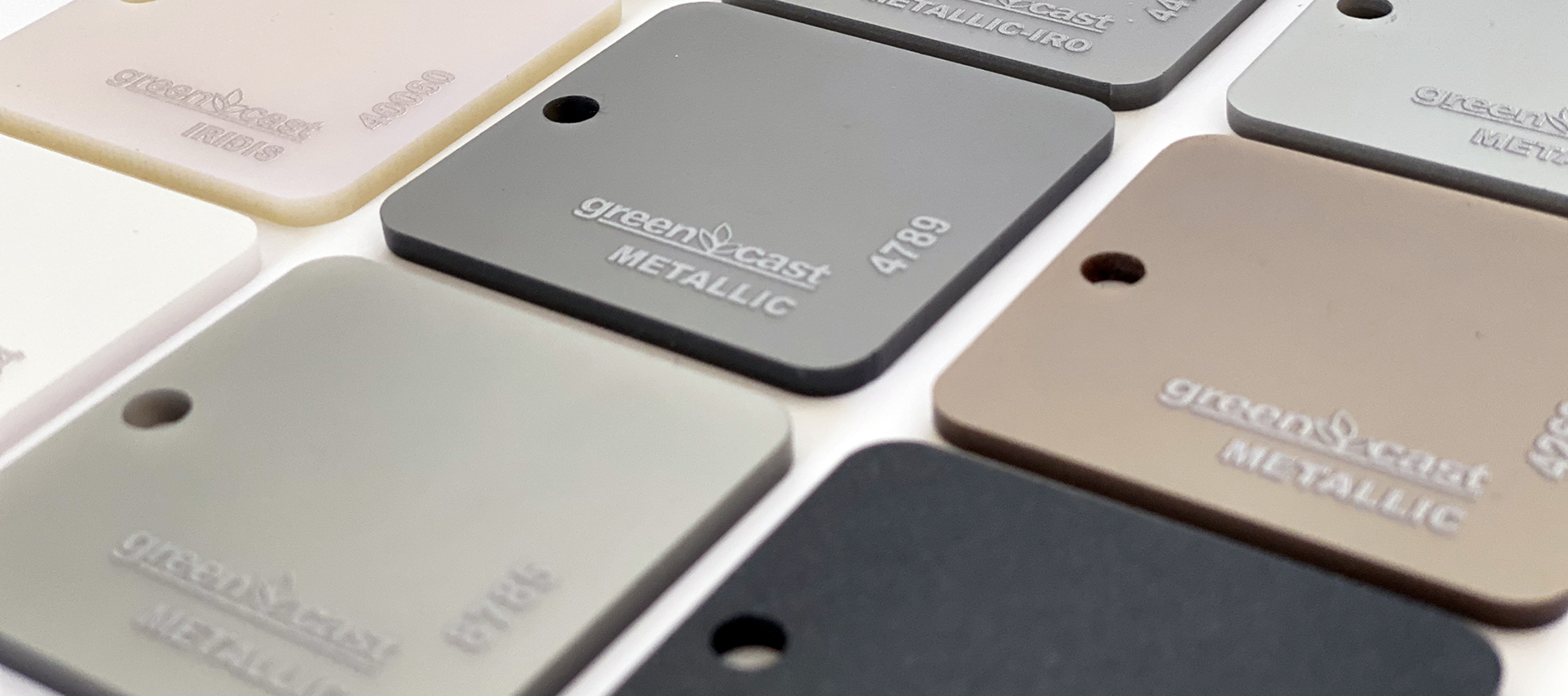 GreenCast acrylic in black, grey, rose-pink, brown and white colours with a mother-of-pearl finish