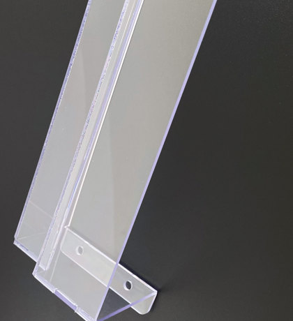 Transparent machine guard of polycarbonate.