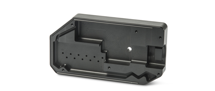 Milled plastic part in black PEHD plastic for a machine