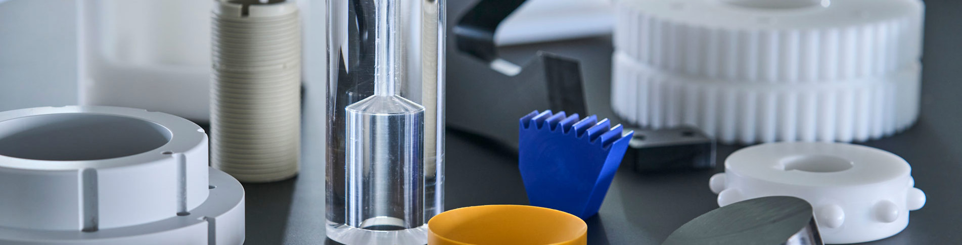 Machine parts of engineering plastics as PEEK, POM and nylon.