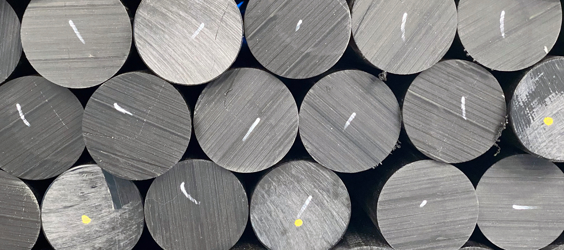 Plastic rods in black POM at Induflex's inventory in Støvring