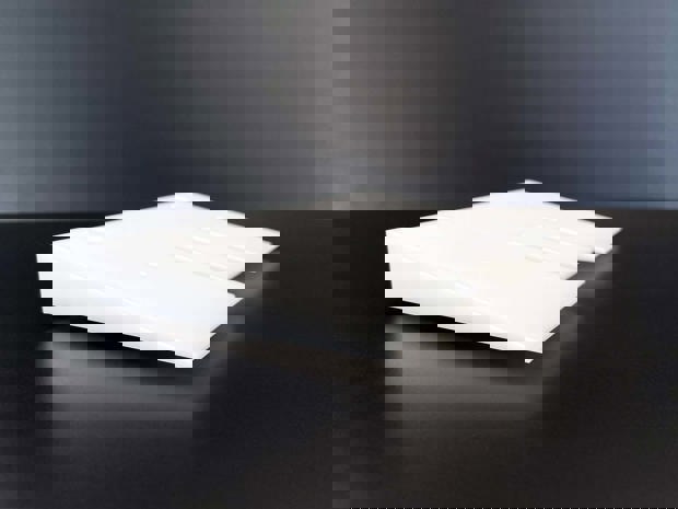 Machine part made from white POM for the labelling solutions of LSS