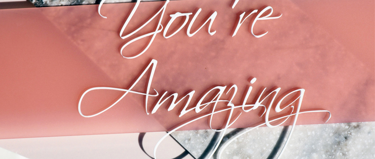 A sign made of matt acryllic with white letters