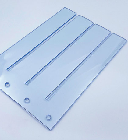 Transparent ribbon curtain on a white bachground.