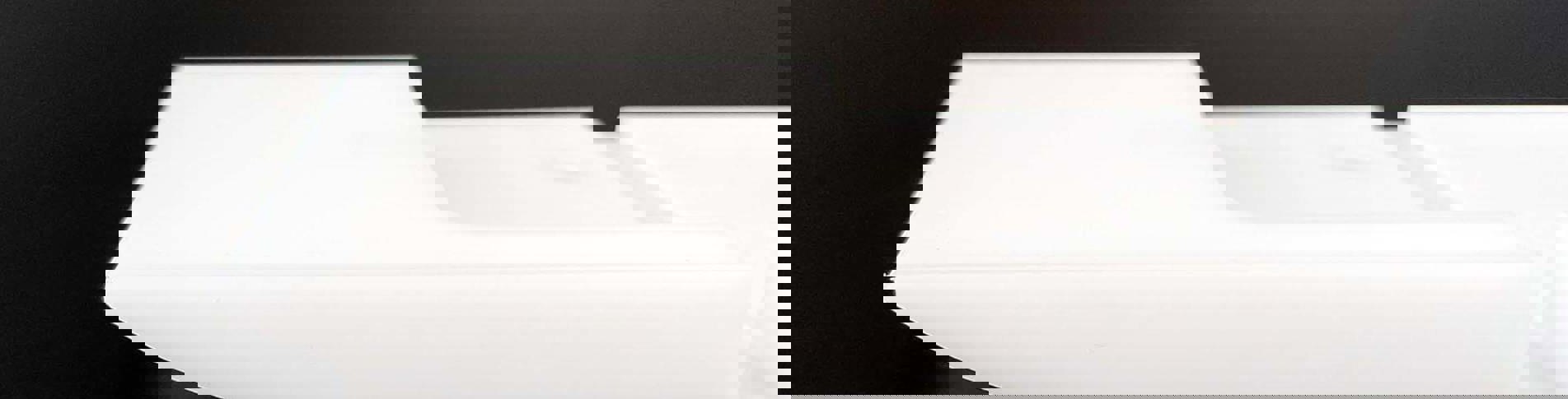 Plastic part milled from white POM plastic